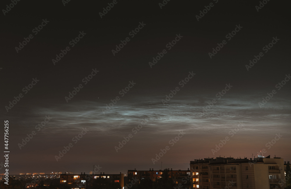 Fototapeta premium Noctilucent clouds shining in the sky during midnight