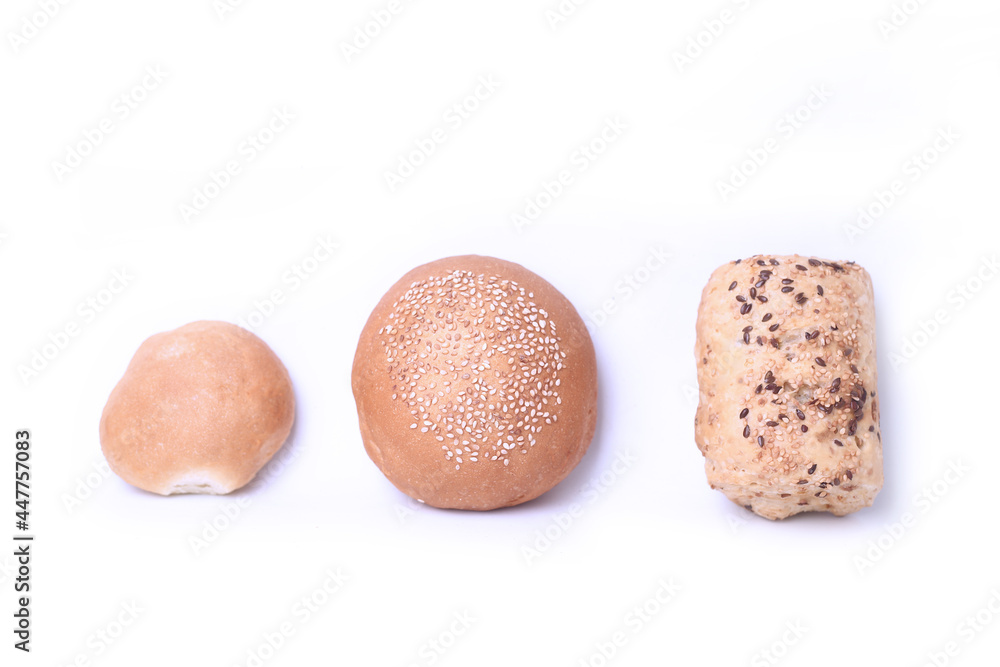 three buns of different kinds isolated on white background flat lay three buns of different kinds isolated on white background flat lay
