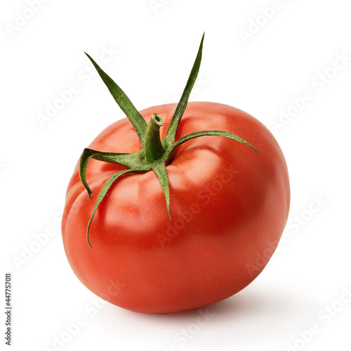 Fresh juicy pink tomato isolated on a white background.