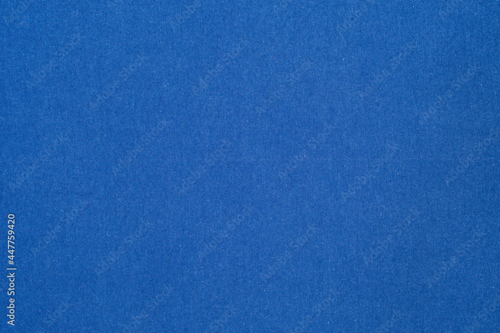 Blue flat fabric made of cotton material. Fabric background in blue tone.