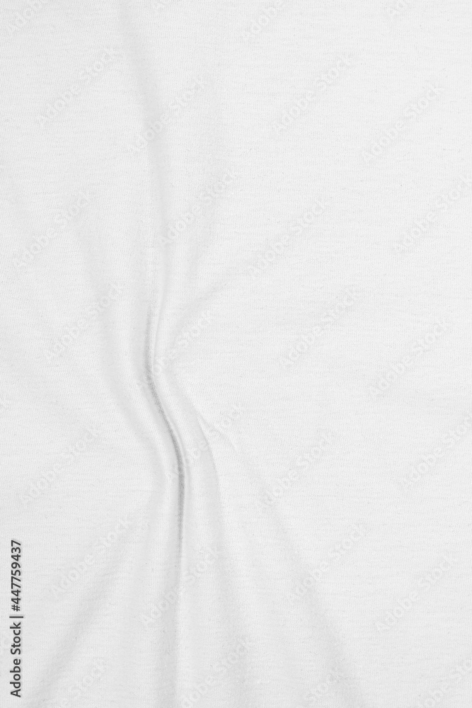 White wavy fabric made of cotton material, wrinkled shape. Fabric background in light tone. White wavy fabric made of cotton material, wrinkled shape. Fabric background in light tone.