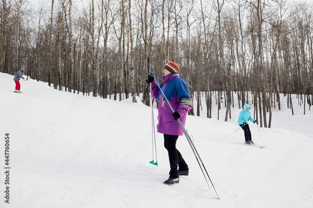 Portrait of a senior skier in a winter forest Portrait of a senior skier in a winter forest