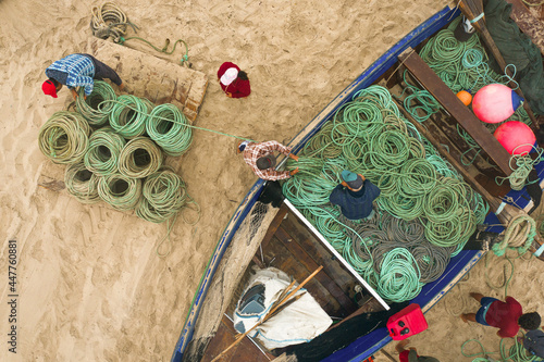 Aerial view of a boat and tractor used for Arte Xávega  in Torreira, Portugal photo