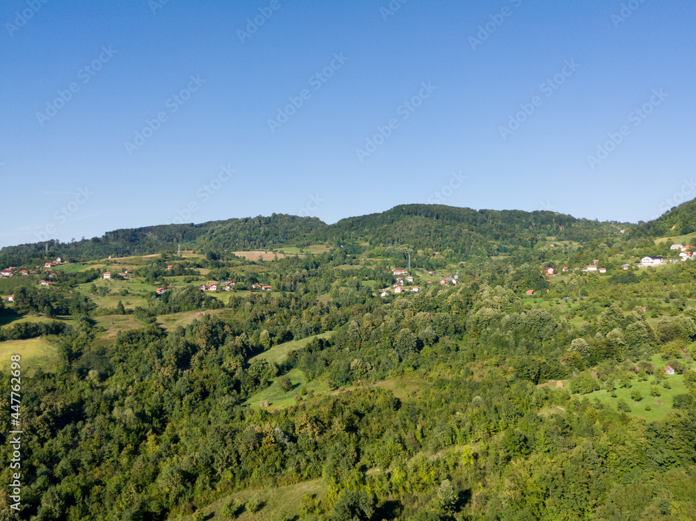 Panoramic hilly landscape of Lower Srebrenik settlement with forests and meadows