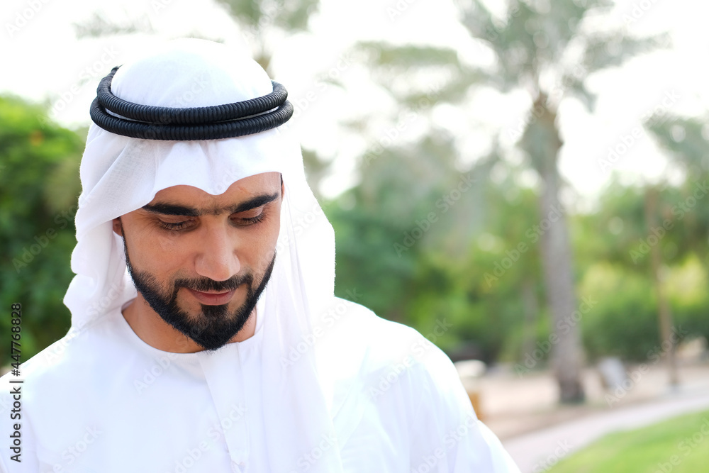 Arab Emirati man on kandura. Portrait of Arabic guy