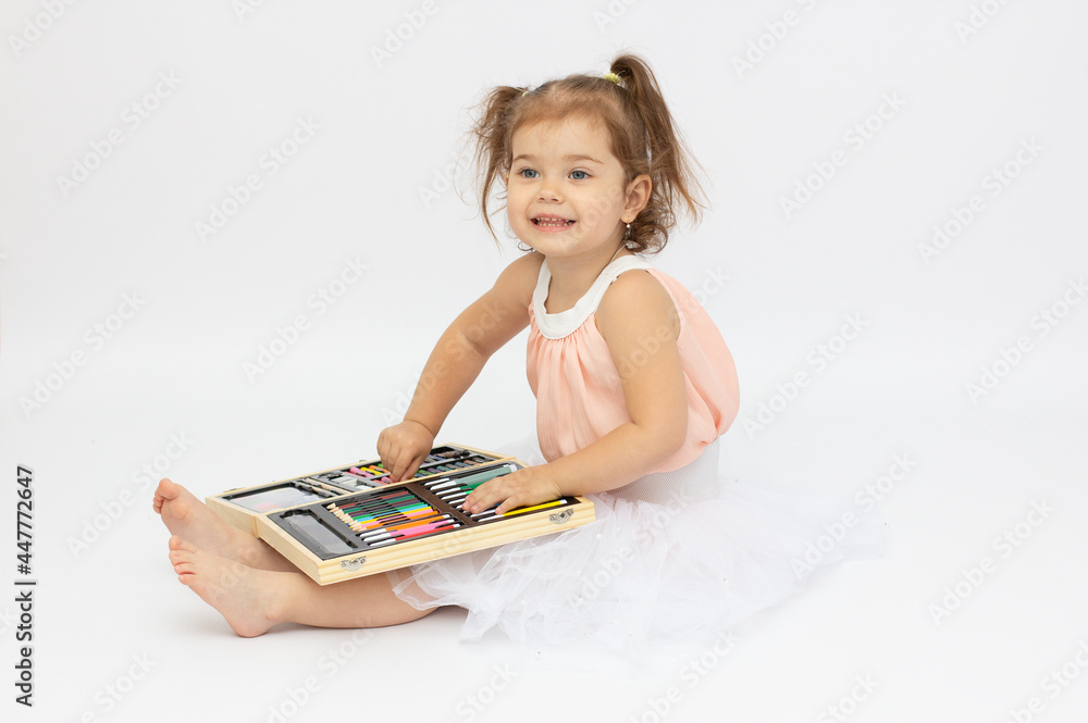 Cute child boy drawing with pencils in preschool isolated Cute child boy drawing with pencils in preschool isolated