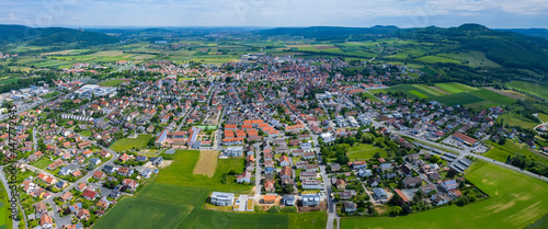 Aerial view of the city Bad Staffelstein in Germany, on a cloudy day in spring.