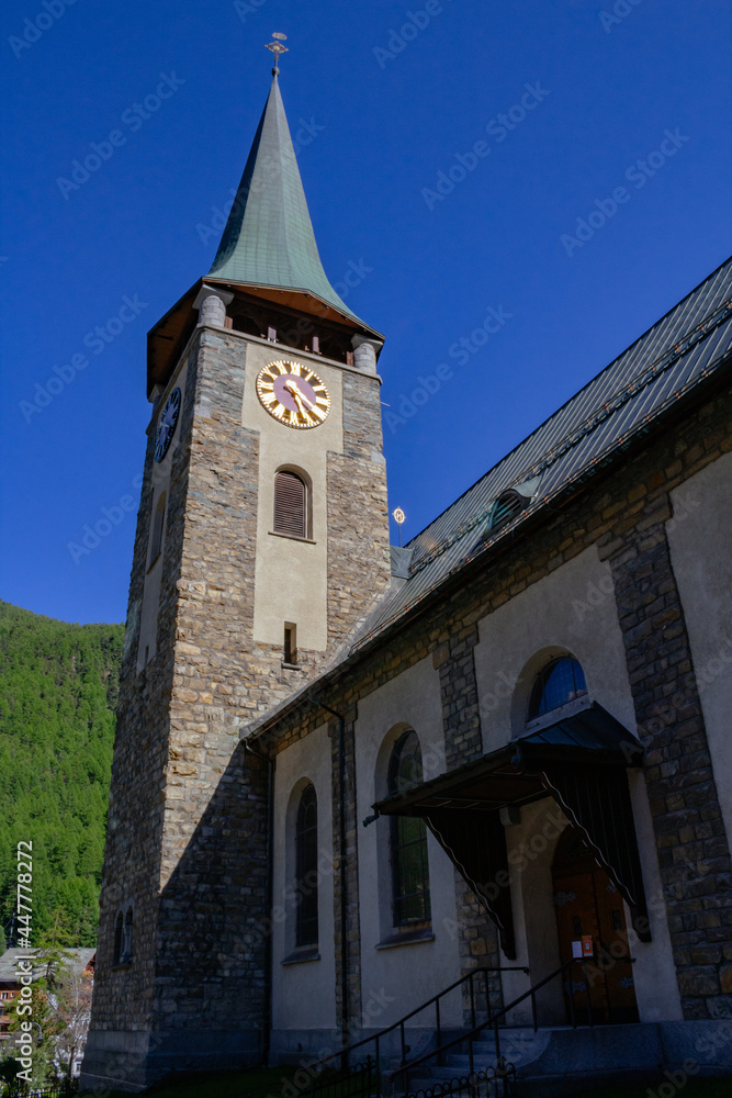 View of Zermatt church with clock tower, Valais, Swiss Alps, Switzerland