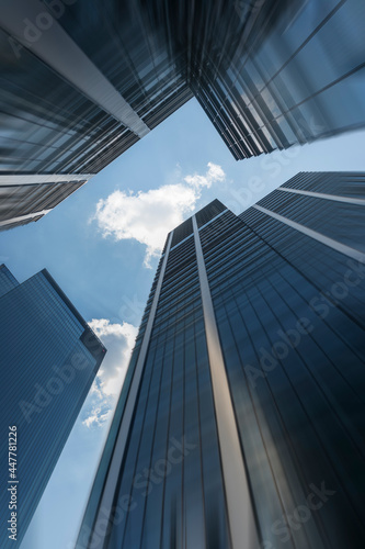 Down angle view of the city skyscrapers with speed blur. Good for architectural, investment purposes as text backdrop.