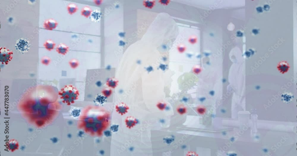 Multiple covid-19 cells floating over group of health workers cleaning the office using disinfectant Multiple covid-19 cells floating over group of health workers cleaning the office using disinfectant