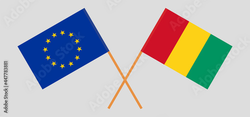 Crossed flags of the European Union and Guinea. Official colors. Correct proportion