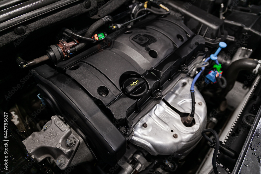Novosibirsk, Russia – July 09, 2019: Citroen C4, close-up of the engine, front view. Internal combustion engine, car parts, deteyling Novosibirsk, Russia – July 09, 2019: Citroen C4, close-up of the engine, front view. Internal combustion engine, car parts, deteyling