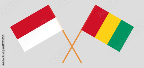 Crossed flags of Indonesia and Guinea. Official colors. Correct proportion