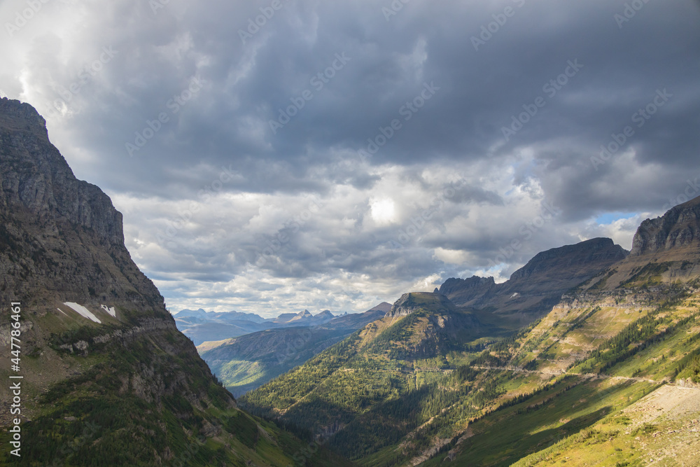 Fototapeta premium View into valley and mountains in Glacier National Park, Montana, USA