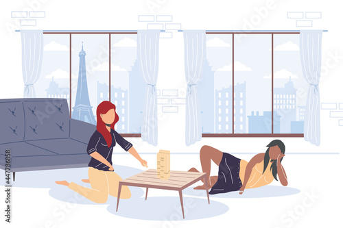 girls playing jenga
