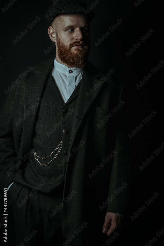 A working class Victorian man wearing a tweed suit with a gold fob chain A working class Victorian man wearing a tweed suit with a gold fob chain