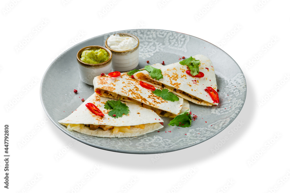 Quesadilla with chicken with guacamole sause and sour cream sause isolated on white. Quesadilla with chicken with guacamole sause and sour cream sause isolated on white.
