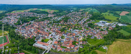 Fototapeta Naklejka Na Ścianę i Meble -  Aerial view of the city Baunach in Germany. On a sunny day in spring.