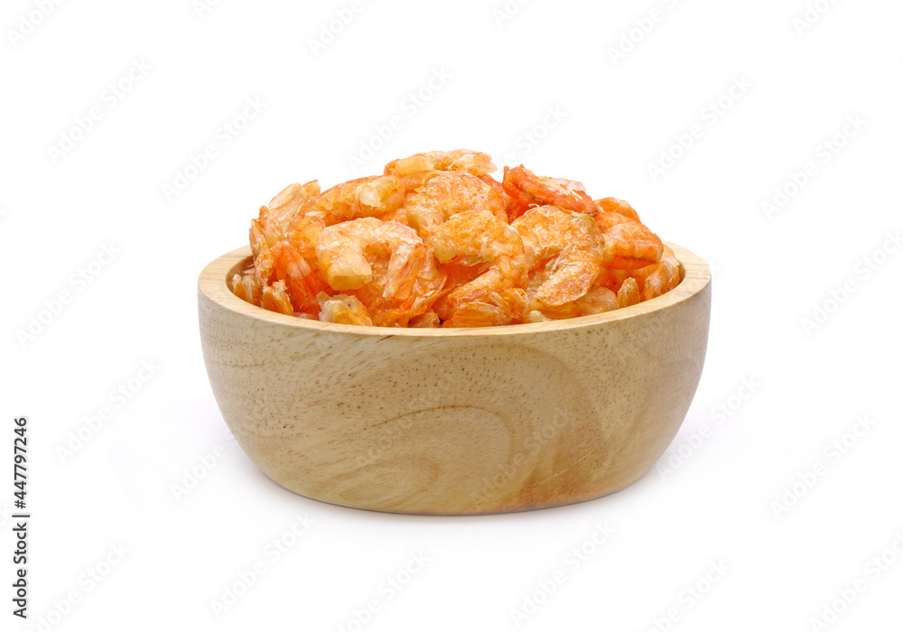 Dried shrimp in wooden bowl isolated on white background Dried shrimp in wooden bowl isolated on white background