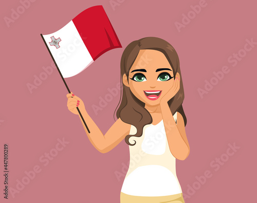 Beautiful young Maltese woman waving Malta flag with hand on face on pink background