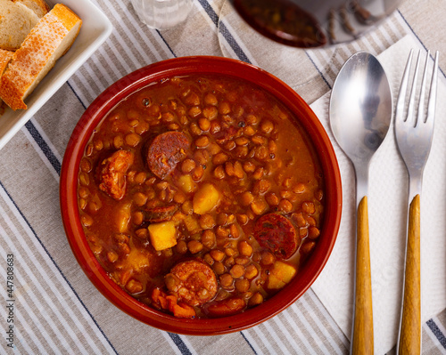 National Spanish dish Lentejas con chorizo, beans stewed with chorizo, bacon and sausages