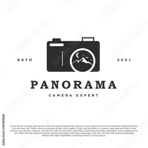 Vintage camera logo design with mountains vector in the lens. For photographer or camera shop