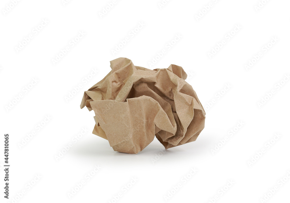 Crumpled brown paper ball isolated on white background. Image with Clipping path Crumpled brown paper ball isolated on white background. Image with Clipping path