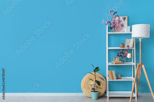 Book shelf with blossoming ...