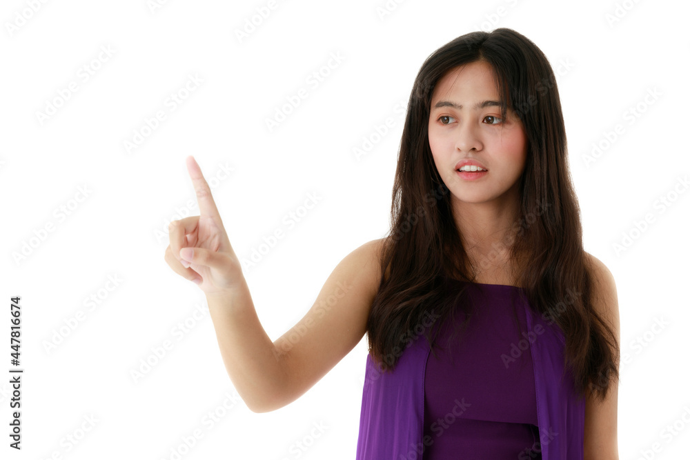 Asian female showing touching gesture in air on white isolated background in studio. Asian female showing touching gesture in air on white isolated background in studio.