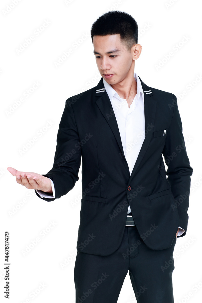 interesting cutout portrait of smart young healthy businessman on black suit standing with smile and happy offering special good product on bare palm with confident interesting cutout portrait of smart young healthy businessman on black suit standing with smile and happy offering special good product on bare palm with confident