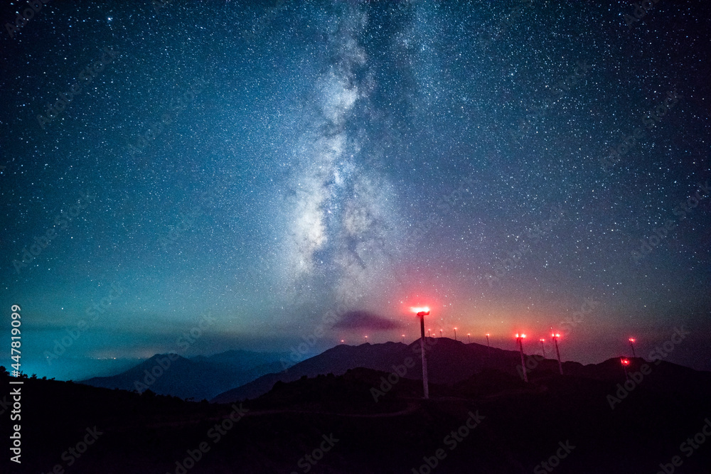 Milky Way starry sky over the mountains