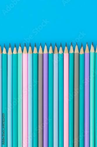 Top view on line of sharp multi colored lead pencils