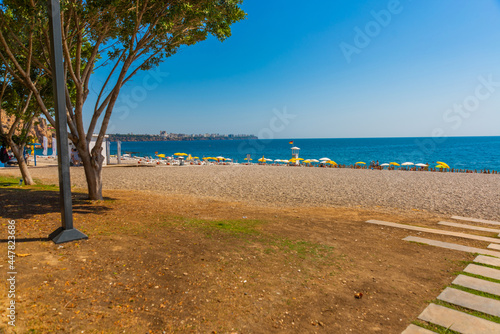 ANTALYA, TURKEY: Konyaalti beach and the Mediterranean sea in sunny summer in Antalya.