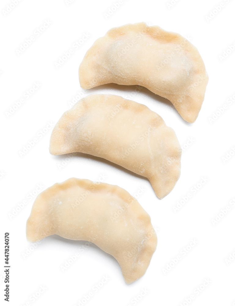 Raw dumplings on white background Raw dumplings on white background