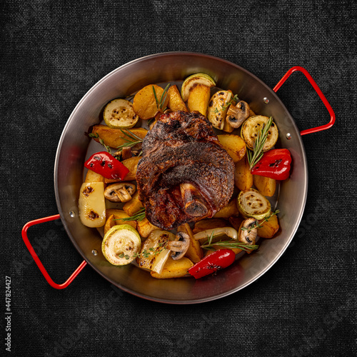 Photography Flat lay of crispy roasted pork knuckle