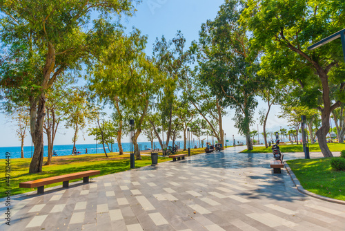 ANTALYA, TURKEY: Trees and roads on the territory of Konyaalti beach in sunny summer in Antalya.