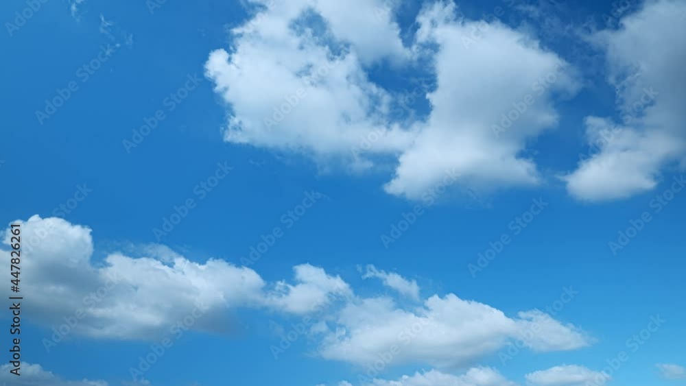 4K Sky Time lapse, Beautiful background, Sky Timelapse of skyscrapers, Blue sky with clouds and sun, Clouds At Sunrise.

