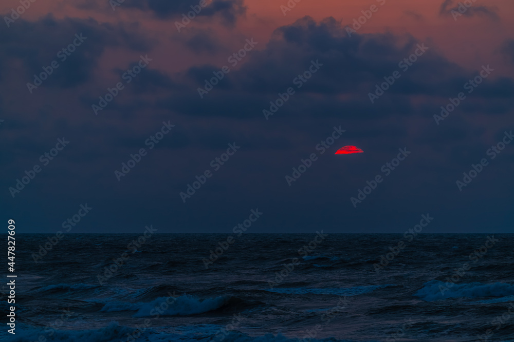 Colorful dramatic sunset on the coast Colorful dramatic sunset on the coast