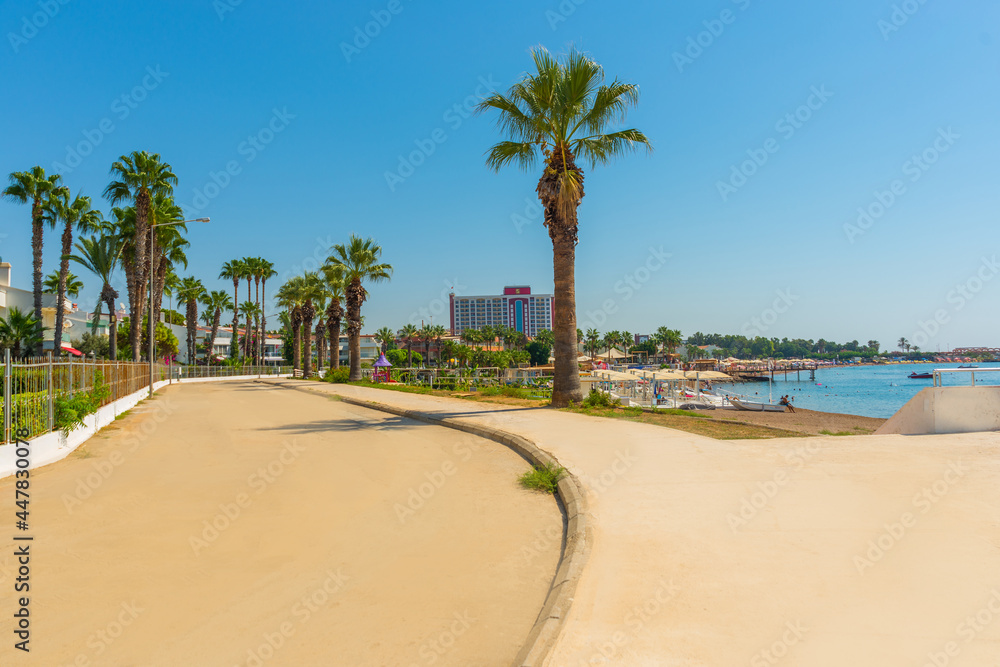 Fototapeta premium ANTALYA, TURKEY: The promenade on the Lara beach in Antalya.