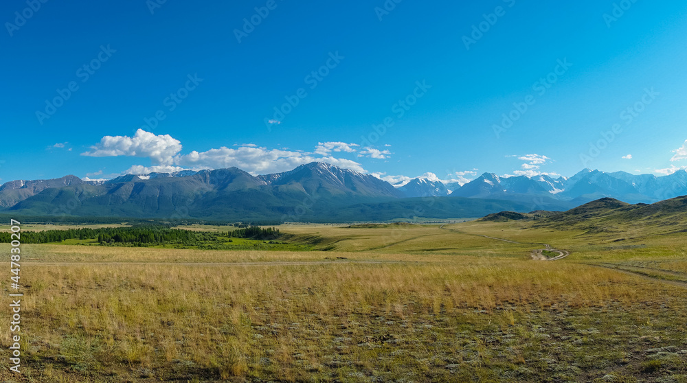 Panoramic view of the meadows and mountains of the North Chuisky ridge in the evening, Altai photo