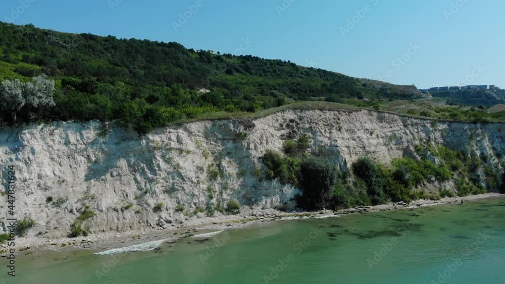 Dense Foliage On White Hills At The Coast Of Black Sea In Balchik, Southern Dobruja, Bulgaria. wide aerial drone Dense Foliage On White Hills At The Coast Of Black Sea In Balchik, Southern Dobruja, Bulgaria. wide aerial drone