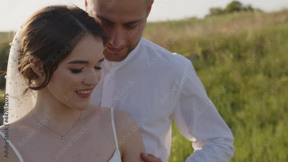 Close up view of happy married couple, green background