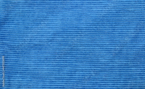 Texture. Blue corduroy fabric. Fabric material