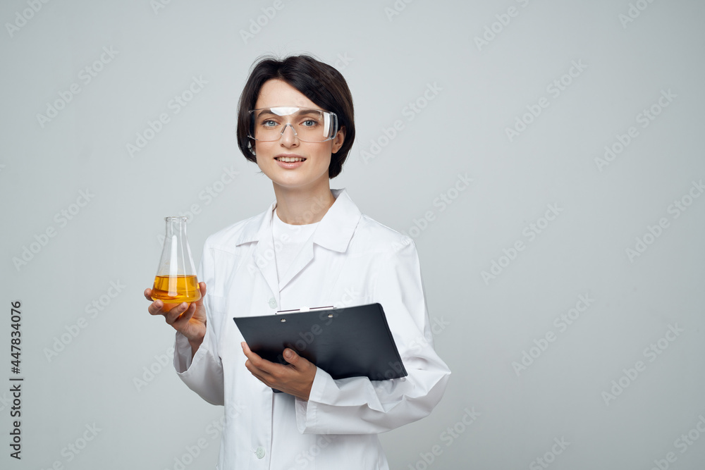 female doctor tests as part of chemistry research female doctor tests as part of chemistry research