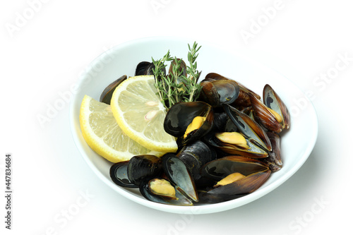 Plate with fresh mussels isolated on white background
