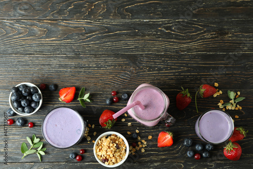 Concept of breakfast with smoothie on rustic wooden table