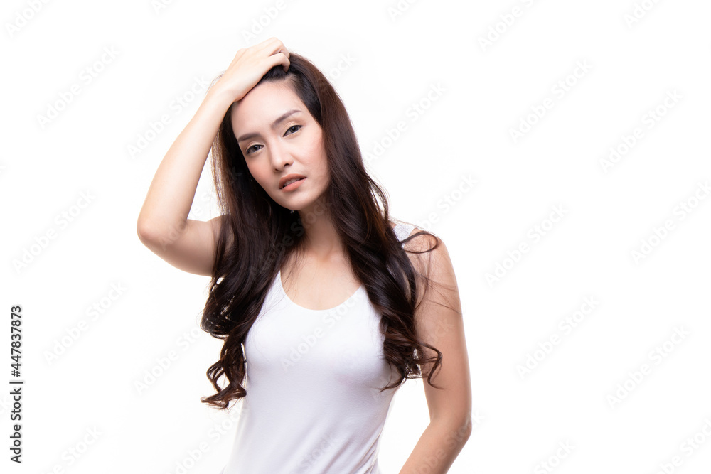 Studio beauty shot concept. Attractive beautiful young asian woman smiling cheerfully with long hair brunette wearing white casual T-shirt standing isolated on white background. Studio beauty shot concept. Attractive beautiful young asian woman smiling cheerfully with long hair brunette wearing white casual T-shirt standing isolated on white background.
