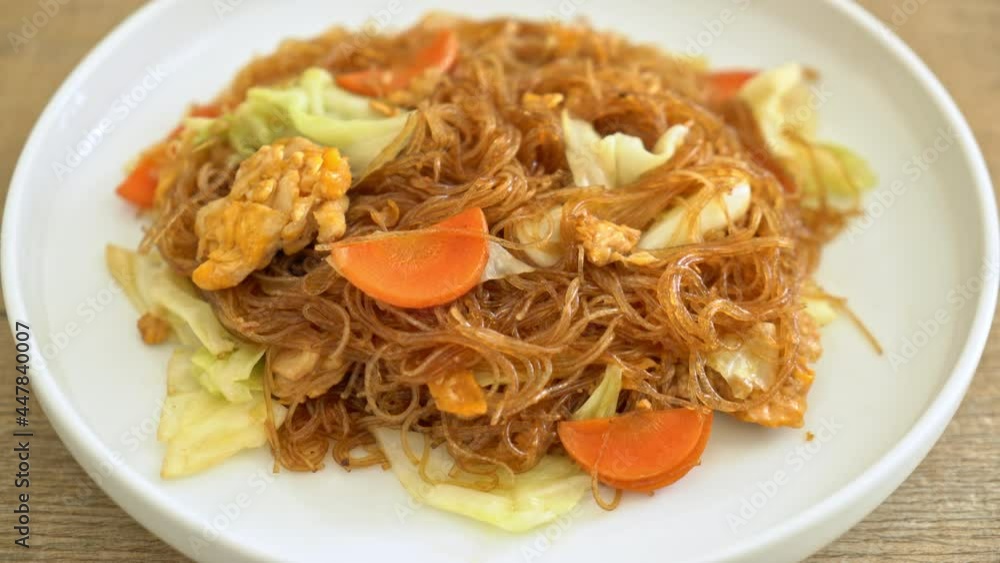stir fried vermicelli with cabbage, carrot and egg - vegan food style stir fried vermicelli with cabbage, carrot and egg - vegan food style