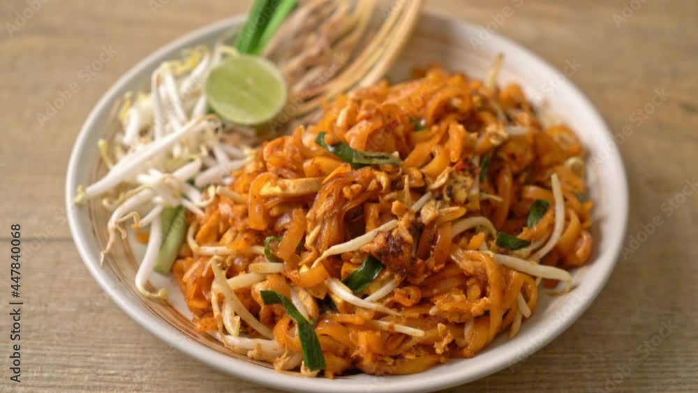 stir-fried noodle with tofu and sprouts or Pad Thai - Asian food style stir-fried noodle with tofu and sprouts or Pad Thai - Asian food style