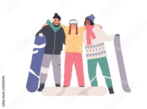Portrait of happy young people in winter sports equipment with snowboards. Sn...